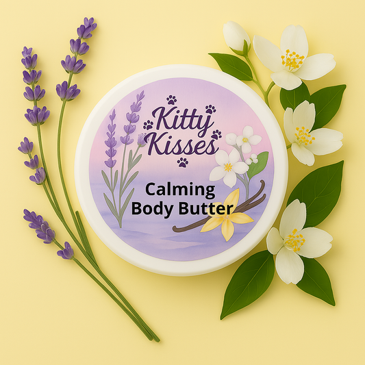 Kitty Kisses Calming Body Butter container with lavender and jasmine flowers on a yellow background