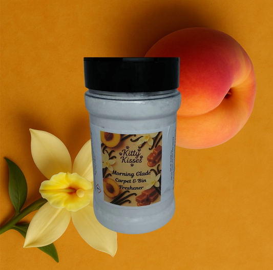 Jar of 'Kitty Kisses' carpet and bin freshener with a peach and flower on an orange background