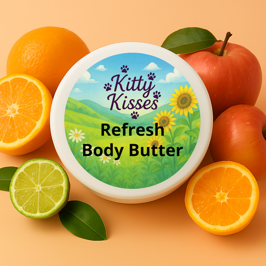 Kitty Kisses Refresh Body Butter container with fruits on a peach background